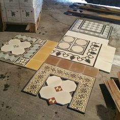 several different types of tiles laid out on the floor