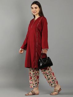 Bing Cherry Maroon Loose V Neck Kurta In Bell Sleeves With Ivory Floral Straight Pant Bing Cherry Maroon kurta with playful summer floral print pant Kurta can also be styled just as a dress Cotton poplin kurta with lace neck line, bishop sleeve and elasted pant waistband detail for relaxed summer look Cold wash and Dry clean only Product doesn't have lining Lining Material: No lining Pattern: Solid, Floral Print Fit: Loose Model Height: The model (height 5'7", Chest 34", Waist 28", Hip 38") is w Cotton Floral Print Sets With Straight Pants, Cotton Sets With Floral Print Straight Pants, Floral Print Cotton Sets With Straight Pants, Casual Cotton Pant Set With Straight Pants, Casual Floral Print Sets With Long Pants, Spring Cotton Pants With Printed Motifs, Casual Cotton Pant Set With Floral Print, Traditional Cotton Floral Print Pants, Traditional Cotton Pants With Floral Print