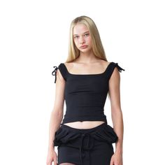 Australian designer Emily Watson launched her eponymous label in 2019, drawing inspiration from coastal Melbourne. Her brand reimagines traditional swimwear with a playful and subversive twist.Cap sleeve -> off shoulder fitted blouse with scooped neckline and tie up shoulders. Decorative panelling at bust featuring signature zig zag inseam detail. Lined at front.Composition: KnitFabric Construction: Main and Lining: 80% Nylon 20% Elastane Fitted Off-shoulder Tank Top For Spring, Black Off-shoulder Fitted Tank Top, Fitted Sleeveless Off-shoulder Top For Summer, Fitted Off-shoulder Tank Top For Summer, Black Fitted Off-shoulder Top For Summer, Fitted Black Off-shoulder Top For Summer, Fitted Elastane Tops For Summer, Fitted Elastane Summer Tops, Fitted Off-shoulder Blouse For Summer