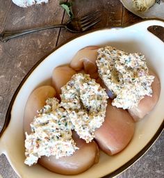 some food is in a white bowl on a table