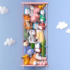 a pink shelf filled with stuffed animals on top of a blue wall next to clouds