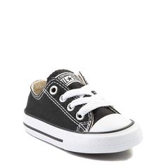 Classic Converse Low Top Chucks for the younger courtsters. You can never be too old or young for the originals. These toddler-sized Converse All Star Lo Sneakers feature a sturdy canvas upper and durable rubber sole. Cotton Sneakers With Soft Round Toe, Black Cotton Canvas Sports Shoes, Black Cotton Canvas Shoes For Sports, Low-top Cotton Non-slip Sneakers, Low-top Non-slip Cotton Sneakers, School Canvas Shoes With Rubber Sole, Sporty Converse Canvas Shoes For School, Converse Cotton Sneakers For School, White Converse Sneakers