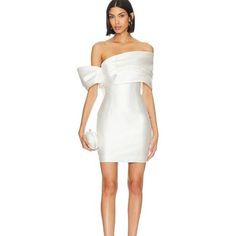 Never Worn, Adorable White Mini Dress From Solace London (Sold On Revolve, Net A Porter, Etc). Currently Being Sold Online For $630. Really Love This Just Got The Next Size Up. Please Note This Is A Uk Size 8 (Us Size 4) Let Me Know If You Want Pics Of This On! I Am The Next Size Up So Any Pics I’d Post Of Me In It Would Be A Uk Size 10. Strapless Mini Dress Revolve, Chic Off-shoulder White Mini Dress, Solace London White Dress, Hot Dresses Short Revolve, Revolve White Dress, Solace London, Revolve Dresses, Selling Online, White Mini Dress