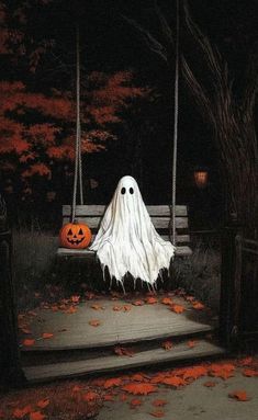 a white ghost sitting on top of a wooden bench next to a tree filled with leaves