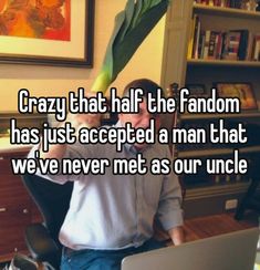 a man sitting in an office chair with a banana on his head and the caption crazy that half the fandom has just accepted a man that we never met as our uncle