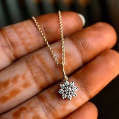 "A pretty 9 diamond flower charm pendant, handcrafted in 14k gold with a dainty cable chain, this feminine necklace is versatile and a perfect everyday jewelry piece! * Flower Size : 8 mm * Gemstone : Natural Diamond * Diamond Wt : 0.31 ct * Color / Clarity : H-I, Vs-Si * Gold - 14K Solid Gold If you like this necklace, please press \"Pin it\" button on the top of your screen. Follow us on Instagram : @abhikajewels Like us on Facebook: www.facebook.com/Abhikajewels Thank you for visiting our sho Diamond Jewelry With Flower Charm, Delicate 14k Gold Diamond Necklace With Cable Chain, Yellow Gold Sterling Silver Diamond Necklace With Flower Pendant, Dainty 14k Gold Flower Pendant Jewelry, 14k Gold Diamond Flower Pendant Necklace, Fine Jewelry: 14k Gold Diamond Necklace With Flower Pendant, Fine Jewelry 14k Gold Diamond Flower Pendant Necklace, Diamond Pendant With Flower Charm, Gift Diamond Necklace With Delicate Flower Pendant