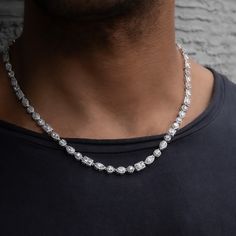 Introducing the Mixed Diamond Pave Chain in 14k White Gold. This eye-catching piece is sure to turn heads, featuring hand-set stones in a variety of shapes and sizes for maximum shine. The captivating design gives you an bold look that's great for any occasion—from everyday wear to special events. With its sleek and modern design, you’ll be sure to make an impression wherever you go! Pair it with the matching Mixed Diamond Pave Bracelet to create the perfect set. This product is guaranteed for l Silver Oval Diamond Tennis Necklace, Luxury Jewelry With Prong Setting And Oval Link, Luxury Oval Link Jewelry With Prong Setting, Luxury Oval Link Diamond Cut Necklace, Luxury Oval Link Diamond Cut Jewelry, Fine Jewelry Diamond Necklace With Oval Link, Oval Link Diamond Necklace In Fine Jewelry Style, Formal Iced Out Fine Jewelry Necklaces, Formal Iced Out Fine Jewelry Necklace