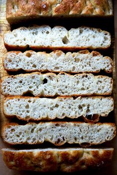 several slices of bread sitting on top of a cutting board