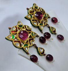 Vintage antique 20 K solid gold Genuine diamond Rubies Emerald set Earrings. Original old piece in good condition. Size-5/2 cm, weight-25 grams 22k Gold Cutdana Earrings For Puja, Heavy Antique Earrings For Festive Occasions, Antique Kundan Meenakari Chandbali Necklace, Yellow Gold Kundan Earrings With Cutdana, Antique Meenakari Chandbali Kundan Necklace, Meenakari Kundan Earrings For Puja, Ceremonial Kundan Earrings In Yellow Gold, Ceremonial Kundan Yellow Gold Earrings, Traditional Yellow Gold Kundan Danglers