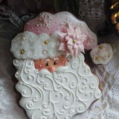 a decorated cookie with a santa clause on it