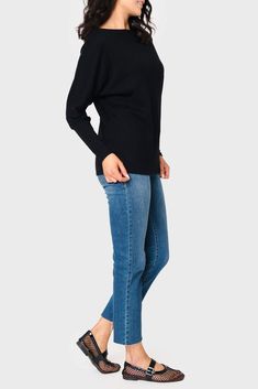 This sweater knit top is the epitome of relaxed style. With its eased fit and slouchy/off-shoulder design, it exudes effortless charm. The long sleeves feature high cuffs, adding a touch of sophistication. Made from super soft fabric, it offers both comfort and a luxurious feel. 50% Rayon | 28% Polyester | 22% Nylon Hand Wash Cold, Dry Flat Length 25 1/2" (size small) Drape Wide Neck Long Dolman Sleeve Eased Fit Easy 30-Day Returns & Exchanges Sabrina is 5'7 and wearing XS in Black & Martini Oli Stretch Casual Long Sleeve Off-shoulder Top, Casual Boat Neck Knit Sweater, Casual Knit Sweater With Boat Neck, Casual Boat Neck Winter Sweater, Casual Boat Neck Sweater For Winter, Casual Winter Sweater With Boat Neck, Casual Soft Knit Off-shoulder Tops, Casual Off-shoulder Soft Knit Top, Casual Off-shoulder Top For Winter