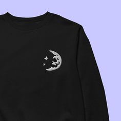 Witchy vibes for you and I. 📦 FREE SHIPPING ON USA ORDERS OVER $35 📦 * High quality embroidery * Unisex, women may want to size down * 50/50 cotton/polyester * Pre-shrunk Black Long Sleeve T-shirt With Embroidered Graphics, Black Crew Neck Sweatshirt With Skull Print, Winter Skull Print Cotton Tops, Winter Cotton Tops With Skull Print, Winter Cotton Top With Skull Print, Black Cotton Sweatshirt With Skull Print, Casual Long Sleeve Sweater With Skull Print, Streetwear Skull Print Crew Neck Sweatshirt, Skull Print Crew Neck Sweatshirt For Streetwear