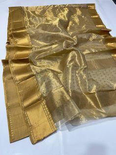 It's a beautiful Original chanderi handloom pure katan silk saree . All over minakari teeli work jaal handmade nakshi border including running plane blouse. Saree length: 6.40m, width: 46in  [ saree 5.50m, blouse 90cm ] Dry clean only . Please note - color may be vary a little due to sunlight and photography . Please message us after purchasing in case you want fall and Pico done it not . No extra charges for fall and Pico but inform us . Blouse stitching is also available . Wedding Saree Silk, Silk Saree Wedding, Blouse Stitching, Katan Silk Saree, Saree Silk, Blouse Saree, Katan Silk, Wedding Saree, Indian Saree