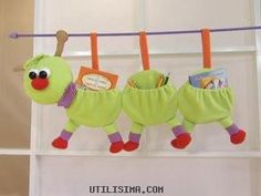 an image of baby clothes hanging on a line with the title how to make your own caterpillars