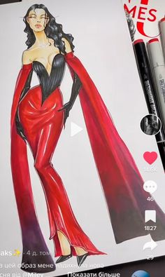 a drawing of a woman in a red dress on a piece of paper with markers