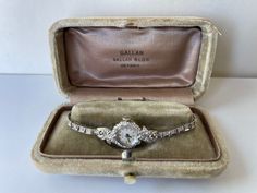 Bulova Ladies Art Deco Solid 14K (585)White Gold Watch Case and Bracelet 4 Ct Genuine Diamonds Original Box Swiss Made Will fit to wrist up to 6.25 inch /16sm. Weight 16 Grams In Great Working Condition, Keep Very Accurate Time. Just recently was serviced. Please have a look at our vintage watches we have constantly listed  MovementManual winding Number of jewels17 Case Case materialWhite gold Case diameter15 x 31 mm  Thickness7 mm Bezel materialWhite gold DialSilver Bracelet/strap Bracelet materialWhite gold ClaspFold clasp Clasp materialWhite Gold Other Only Original Parts White Gold Watch, Gold Case, Women Wrist Watch, Swiss Made, Watch Case, Vintage Watches, Gold Watch, Jewellery And Watches, Favorite Jewelry