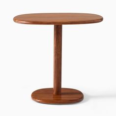 a small wooden table with a circular base on the top and one leg raised up