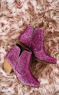 Some of our best selling booties last year were the charcoal version of these. They are back in fuschia! NOTHING quite says 'I'm here for the party' like a pair of glitter booties. Rubber heel and sole.  3 inch heel  Fit true to size, if you are in between sizes, go with your larger size. If your foot is wide at all, a Athleisure Tops, Waterproof Jewelry, 3 Inch Heels, Denim Leggings, Rubber Heels, Pink Glitter, Back To Black, Outerwear Women, Long Tops