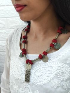 Beautiful vintage necklace with in dark red thread and vintage coins and little jhumkis -Free Shipping worldwide -Shipping is by India Post and sometimes can take longer than expected. (Minimum 10-20 days) -Shipping timelines are not in our hands specially during Peak Season. So please order accordingly -Message us if you want Expedite Shipping -We dont accept returns. -Feel free to ask any questions regarding the product before making the purchase. Vintage Coins, Diy Necklace Making, Thread Necklace, Boho Jewellery, Red Thread, Handmade Fashion Jewelry, Embroidery Blouse Designs, Textile Jewelry, Oxidised Jewellery