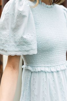 Model is 5'8 and wearing a small. Our best-selling Jolene dress is feminine ease at its finest. This smocked bodice dress allows for movement while a fluttery sleeve keeps things light and sweet. Our Icy Eyelet offers even more feminine detailing to this perennial favorite silhouette with a light blue ground and embroidered flowers and scalloping. Add in a swingy, tiered skirt that is both comfortable and flattering and you've got our dream dress (and by all accounts, yours too!) Enjoy 15% off w Mass Outfit, More Feminine, Bodice Dress, Boring Clothes, Yes To The Dress, Eyelet Dress, Fashion Fits, Tier Skirt, Types Of Dresses