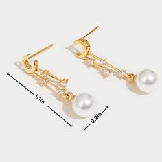 The moon glows softly every night in the sky. It serves as a reminder that no matter how dark it may appear to be, hope & light can be found anywhere. Keep these beautiful earrings close to chase your dreams and follow your heart always. 18K gold plated Imitation pearl, crystal Size: 1.1in x 0.2in Pushback stud closure Hypoallergenic, lead & nickel free If you aren't in LOVE with your purchase, please let us know within 30 days of receiving your item, and you'll receive a stress-free refund. Elegant White Moon Phase Earrings, Elegant Hypoallergenic Moon Shaped Earrings, Hope Light, Chase Your Dreams, Pearl Crystal, Moon Glow, Small Earrings Studs, Follow Your Heart, Jewelry Ring Box