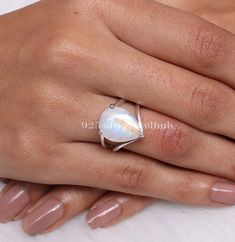 Rainbow Moonstone Ring, 925 Sterling Silver Ring, Crystal Ring, June Birthstone Ring, Handmade Silver Jewellery, Wedding Gift for Women Gemstone Name - Rainbow Moonstone  Stone Quality - AAA Ring Weight - 5.04 gm Ring Length - 2 cm  Ring Width - 1.4 cm  Stone Shape - As shown in the picture Ring Size - All Ring Size Available  You'll get the exact product as shown in the pictures We serve complete 925 sterling silver Jewelry and genuine properties of the stone. The products are dispatched from the small business from USA. Product Quality and Packaging - Our all products are 925 Silver Stamped which shows that the product is genuine and authentic .The products are dispatched from the small business from USA so you get the product on time and the product packaging comes in bubble foil wrap w White Moonstone Pearl Ring Gift, White Moonstone Open Ring Jewelry, Silver Sterling Moonstone Wedding Ring, White Moonstone Open Ring For Anniversary, White Open Moonstone Ring For Anniversary, White Moonstone Open Ring With Gemstone, Minimalist White Moonstone Ring For Anniversary, Silver Stackable Moonstone Rings, Silver Stackable Moonstone Ring For Anniversary