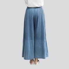 Introducing the 2023 Spring-Summer Collection the Pleated Culottes Women's Denim Pants Y2K Style. the perfect combination of timeless and vogue trend. Crafted from high-quality denim fabric. these jeans offer a flattering high-waisted fit with a rubber closure and light wash finish. With a unique year-2000 design. these divided-skirt are a testament to vogue fashion and classic charm.Why These Jeans Should Be Your Next Purchase Modern Y2K Design: Featuring a unique y2k design. these jeans are th Spring Pleated Wide Leg Pants, Spring Wide Leg Dark Wash Cropped Jeans, Spring Cotton Wide-leg Pants, Pleated Ankle-length Wide Leg Pants For Spring, Spring Pleated Ankle-length Wide Leg Pants, Chic Washed Blue Wide Leg Jeans, Chic Wide Leg Washed Blue Jeans, Casual Summer Jeans With Elastic Waistband, Spring Cotton Culottes With Cropped Leg