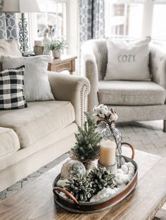 a living room filled with furniture and decor