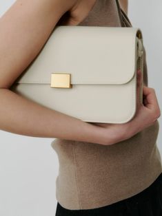 Our best selling classic shoulder bag now comes in a pebble cream leather as requested by so many of our customers. Born out of the desire for a classic and understated accessory that can elevate any outfit effortless and take you from work to weekend. Classic Cardigan, Classic Coats, Summer Scarves, New Launch, Free Giveaway, Cow Leather, Sale Items, Bags Designer, Dust Bag