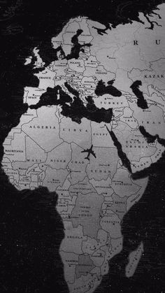 the shadow of an african continent on a black and white background is seen in this image