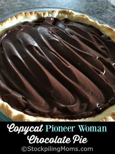 a chocolate pie sitting on top of a table with the words copycat phone woman