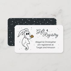 a white and black business card with an image of a dog holding a piece of food in it's mouth