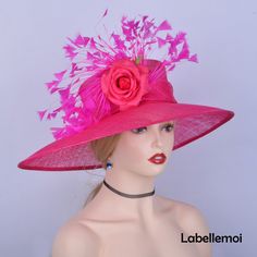 Large brim sinamay hat with feather flower&silk flower Brim width:19.5cm in the biggest part Crown height: 10cm Head size: 57cm also with elastic to adjust it to be smaller Ideal for wedding/party/races/church Big hat only send by EMS(don't send it by regular parcel in case any damage),EMS costs 5-15 working days to most of the countries.Suggest to buy one week earlier at least to make sure it can arrive in time. It is handmade product and every hat is well inspected before shipment,no retur