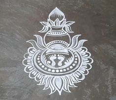 an intricately designed design on the side of a building with a lotus and omesh symbol