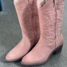 Saddle Up In Style With A Chic Take On A Western Boot. Add A Touch Of The Wild West To Your Wardrobe With These Steve Madden Pink Cowboy Boots In Size 5. Perfect For Any Occasion - Whether It Be Travel, Casual Outings, Or Workwear - These Boots Feature A 2-Inch Block Heel And A Pointed Toe Shape. The Mid-Calf Shaft Style And Medium Calf Width Provide A Comfortable And Snug Fit. You Can’t Go Wrong Pairing These Bad Boys With Jeans Or A Maxi Dress Wide Calf Closed Toe Boots For Spring, Trendy Mid-calf Boots With Medium Width, Casual Pink Mid-calf Boots For Spring, Pink Casual Boots Medium Width, Casual Pink Boots Medium Width, Casual Mid-calf Boots With Stacked Heel And Round Toe, Casual Pink Mid-calf Boots With Round Toe, Casual Pink Medium Width Boots, Spring Closed Toe Moto Boots