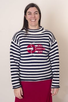 Celebrate Maine, the sea, and discovery with this fun lobster sweater! Featuring classic nautical stripes and a bright red Maine lobster applique, this cozy acrylic sweater is perfect for cold winter nights and beyond. Lobsters symbolize protection, strength, nobility, discovery, abundance, regeneration, and transformation. Lobster Sweater, Paper Star Lanterns, Baja Hoodie, Maine Lobster, Nautical Stripes, Acrylic Sweater, Alpaca Sweater, Winter Nights, Sari Silk