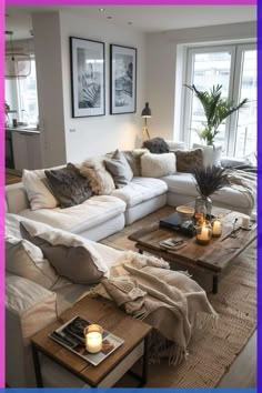 a living room filled with lots of white furniture