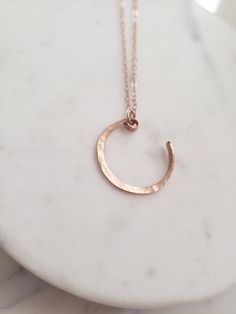 A subtle lightweight statement! Hand formed and hammered crescent moon adds a touch of an organic element to the piece. Choose from your choice of sterling silver, 14k gold fill, or 14k rose gold fill. Gold fill does not wear off or tarnish and contains 100 times more gold than plated jewelry! Finished with a lobster clasp. (All components are sterling or gold fill) no cheap finishing touches ;) Minimalist Hammered Copper Jewelry, Minimalist Rose Gold Necklace With Moon Charm, Minimalist Rose Gold Copper Jewelry, Dainty Hammered Rose Gold Necklace, Gold Crescent Moon Necklace, Witchy Necklace, Crescent Moon Necklace Gold, Gold Crescent Moon, Criss Cross Ring