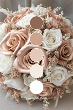 a bridal bouquet with white and pink flowers on it, including roses in shades of brown