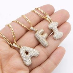 "CZ Bubble Initial Letter Chain & Pendant Necklace Set Real 10K Yellow Gold * MetalReal 10K Yellow Gold (Properly Stamped, 10K)  * ConditionBrand New  * FinishPolished  * Average Weight : 16\" : 6.26 grams  18\" : 6.67 grams  20\" : 7.08 grams  22\" : 7.49 grams  24\" : 7.90 grams  * Length : Chain: Selectable  Pendant: Approx. 1\"  * Width : Chain: 2.5mm  * Clasp/Bail : Lobster Lock" Anniversary Initial Pendant Chain Jewelry, Anniversary Jewelry With Initial Pendant Chain, Anniversary Chain With Initial Pendant, Anniversary Initial Pendant Chain, 14k Yellow Gold Iced Out Necklace, Iced Out Gold Plated Jewelry Gift, Gold Bling Necklaces For Valentine's Day, 14k Gold Iced Out Necklace Gift, Gold Bling Necklace For Valentine's Day