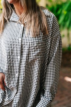 The Urban Moments Gingham Set - Top redefines modern chic with its relaxed, oversized silhouette and timeless gingham pattern. This top features a button-up front that adds a touch of classic sophistication, while the loose fit provides an effortlessly stylish and comfortable drape. Crafted from a soft, breathable fabric, it ensures all-day comfort and easy movement. Perfect for both casual outings and laid-back office wear, the Urban Moments Gingham Top is a versatile wardrobe staple that combi Gingham Set, Gingham Top, Loungewear Dresses, Gingham Pattern, Gingham Tops, Versatile Wardrobe, Oversized Silhouette, Sandals For Sale, Short Leggings