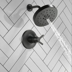 The Delta T17T271-BL is a 17T series shower trim from the exquisite Galeon collection. This bath collection brings a carefully crafted, chiseled, contemporary look to the bath with a design inspired by the shape of sailboats.One of the benefits of this matte black shower trim is how simple it is to clean and maintain. Smears, marks, stains, fingerprints, and scratches are less visible on matte black fixtures than on chrome or other metallic surfaces. Furthermore, no unsightly water stains will be left behind.Another impressive feature is the soft, rubber Touch-Clean spray hole nozzles, which allow you to easily wipe away calcium and lime buildup from your shower head's spray face with the touch of a finger.Delta showers with TempAssure thermostatic valves like this T17T271-BL shower trim a Black Fixtures, Black Tub, Rain Shower System, Adjustable Shower Head, Bath Collection, Delta Faucets, Pop Ups, Black Shower, Tub Filler