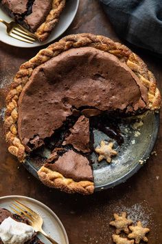 a chocolate pie with one slice missing from it