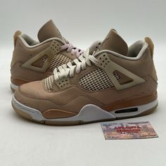 Elevate your sneaker game with these stunning Air Jordan 4 Retro Shimmer W sneakers. Crafted with a beautiful nubuck upper material, these sneakers are perfect for any fashion-forward woman. The silhouette of the Jordan 4 Retro Shimmer W is athletic and trendy, making it the perfect choice for any occasion. These sneakers are part of the Air Jordan product line and feature a stylish brown color. The DJ0675-200 style code is a must-have for any sneaker enthusiast. These sneakers are available in Jordan 4 Retro Shimmer, Jordans 4, Jordan 4s, Jordan 4 Retro, Air Jordan 4, Air Jordan 4 Retro, Sneaker Games, New Wardrobe, Brown Color