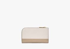 Reach for our Devin slim wallet on repeat. It’s made from scratch-resistant Saffiano leather so it’ll last for years to come. | Kate Spade Devin Colorblocked Small Slim Bifold Wallet, Timeless Taupe Luxury Kate Spade Wallets For Daily Use, Kate Spade Wallet, Slim Wallet, Bifold Wallet, On Repeat, Christmas 2024, Kate Spade, Wallet, Christmas