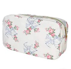 a white floral print cosmetic bag