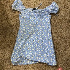 Light Blue With Daisies. Tie Front With Cap Sleeves. Never Worn. Cotton Spandex Mix. Size L. No Damage. Open To Offers! Bundle Discount Offered! Casual Fitted Blue Mini Dress, Light Blue Fitted Mini Dress, Light Blue Fitted Casual Mini Dress, Spring Stretch Cotton Mini Dress, Stretch Cotton Mini Dress For Spring, Trendy Forever 21 Summer Dresses, Forever 21 Blue Spring Dresses, Spring Stretch Mini Dress, Fitted Casual Mini Dress For Vacation