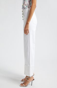 Hit refresh for white-jeans season with this wide-legged pair cut to a very cuffable length for extra trend-right style points. 28 1/2" inseam; 20 1/2" leg opening; 11" front rise; 15 1/2" back rise (size 8) Exposed-button fly Front patch pockets; back patch pockets 75% cotton, 25% polyester, 1% elastane Dry clean or machine wash, tumble dry Imported Cropped Flare Pants, Cuffed Jeans, Jean Trends, Cropped Flares, Wide Leg Denim, Flare Pants, Straight Leg Pants, Cropped Jeans, Wide Leg Jeans