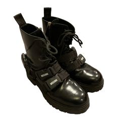 Moschino Italy Vintage Signature Strap Belted Black Leather Combat Moto Boots Chunky Platform Shoes Sz 41 Or Us Sz 10 Women’s, Like New Condition, Worn Just Once, Lace Up Style With Easy Side Zip Entry. Moschino Signature Logo On Straps. Made In Italy, Gorgeous And Classic Luxury Boots. Great For Work, Party, Rock, Music, Night Out! Will Ship Right Away. Check Out My Other Designer Items. Grunge, Goth, Rocker, Band, Punk, Luxury, Boho Chic, Bohemian, Festival, Biker, Motorcycle Chunky Platform Shoes, Luxury Boho, Moschino Shoes, Music Night, Luxury Boots, Boots Chunky, Party Rock, Boots Platform, Italy Vintage