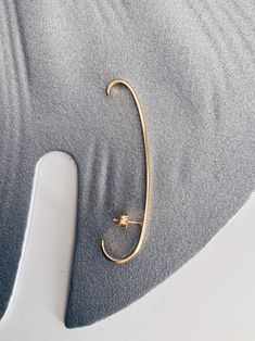 A minimalist design with simple lines and geometric shape fits . It's light and comfortable to wear . -Total length 10cm / 3.93 inches -From stud to bottom 1,5cm / 0.59 inches I use 925 Sterling Silver and then double gold plated with 22k gold. I do not use molds, every piece of jewelry is made from sterling silver sheet and wire. All of my jewelry is handmade please allow for small variances from piece to piece ,as this is a feature of owning one of the kind original handmade jewelry. Please be Everyday Minimalist 14k Gold Ear Cuff, Modern 14k Gold Single Ear Cuff, Gold Minimalist Ear Climbers, Minimalist 14k Gold Ear Cuff, Minimalist Ear Cuff With Matching Earrings, Minimalist 14k Gold Single Ear Climber, Minimalist Gold Plated Single Earring, Minimalist Ear Cuff With Matching Earrings For Everyday, Minimalist Gold Plated Drop Cartilage Earrings